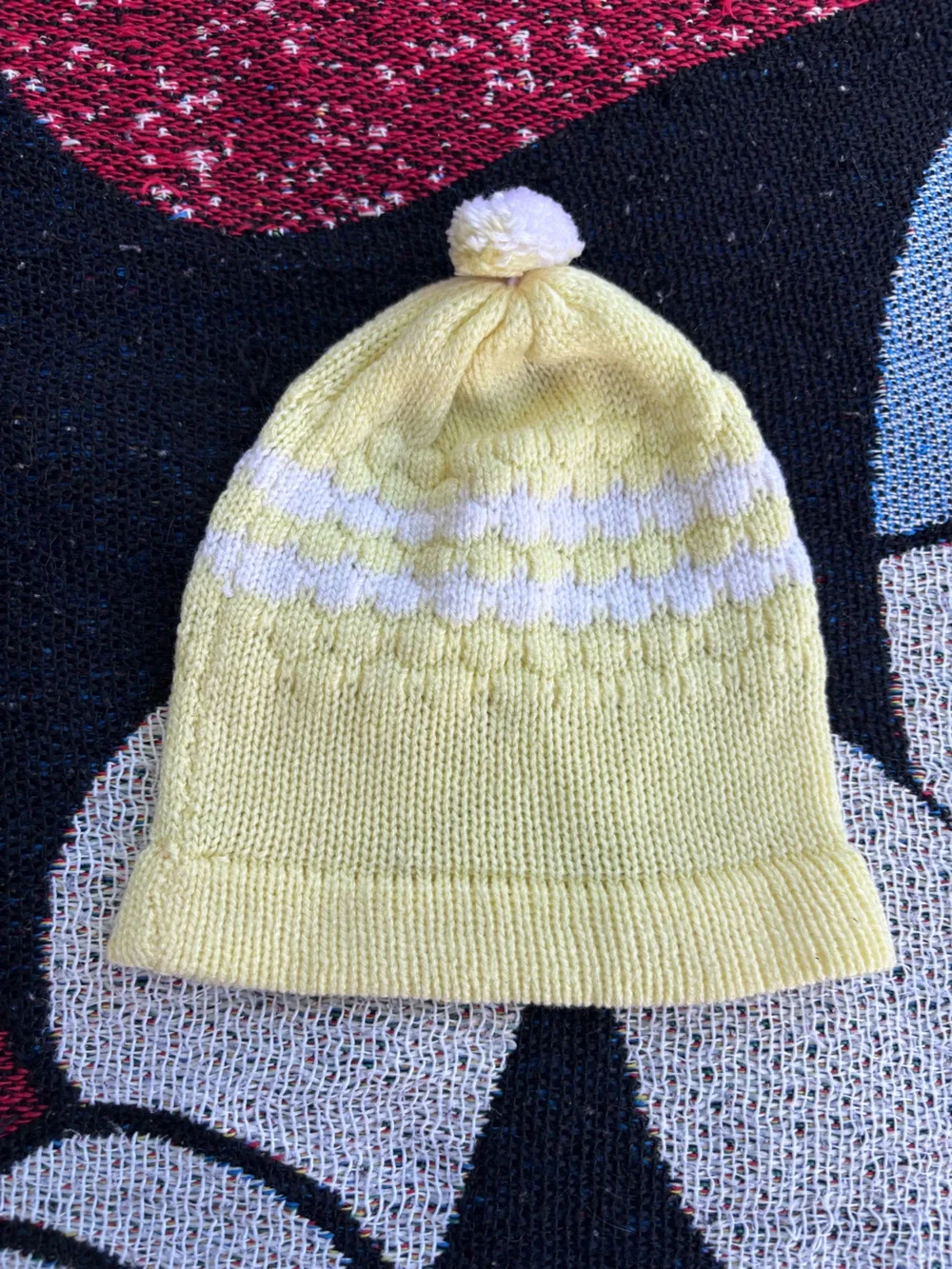VINTAGE YELLOW AND WHITE KNITTED POM POM BABY HAT